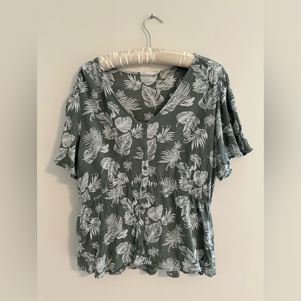 Green and white leafy pattern blouse